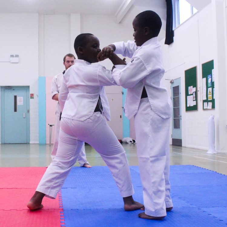 Two students practicing self defence